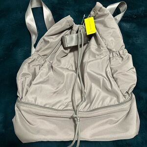 Beyond Yoga Silver Drawstring Backpack. NWT